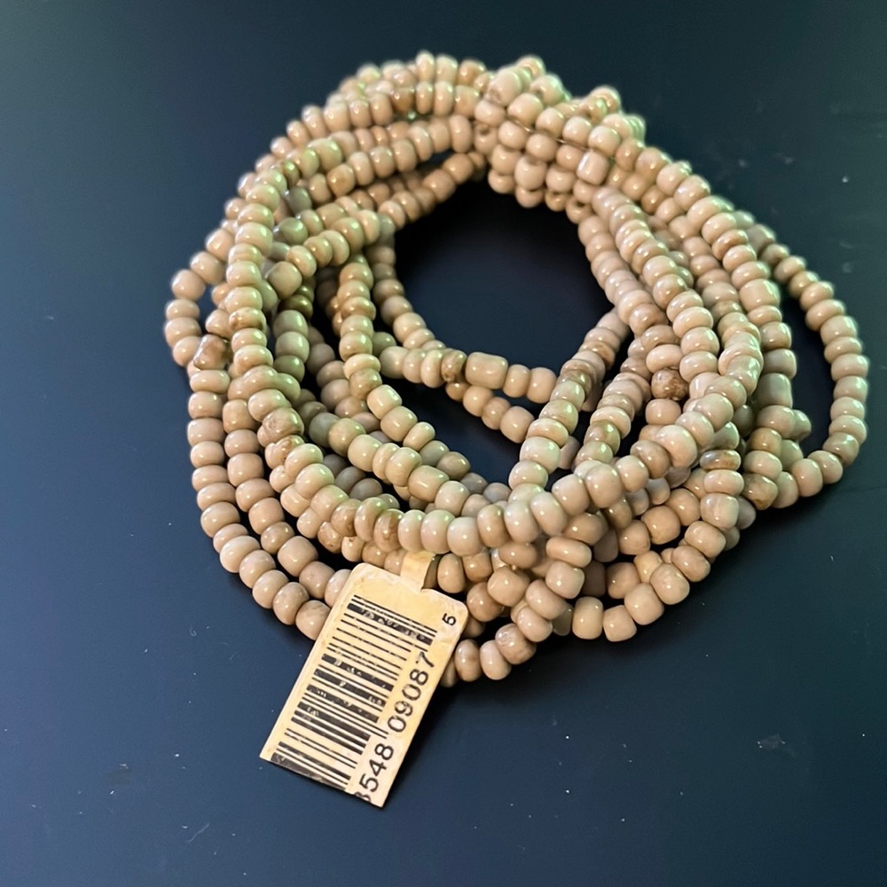 New knot trace cream bracelet.